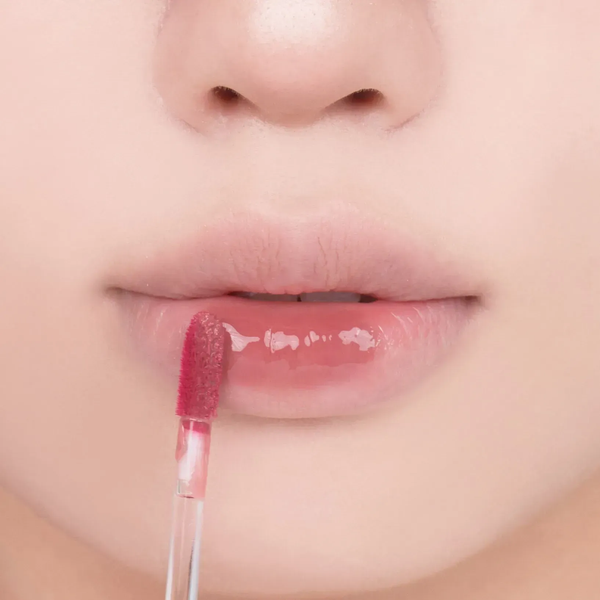 Соковитий глянцевий тінт для губ rom&nd Juicy Lasting Tint 03 Bare Grape 61127 фото